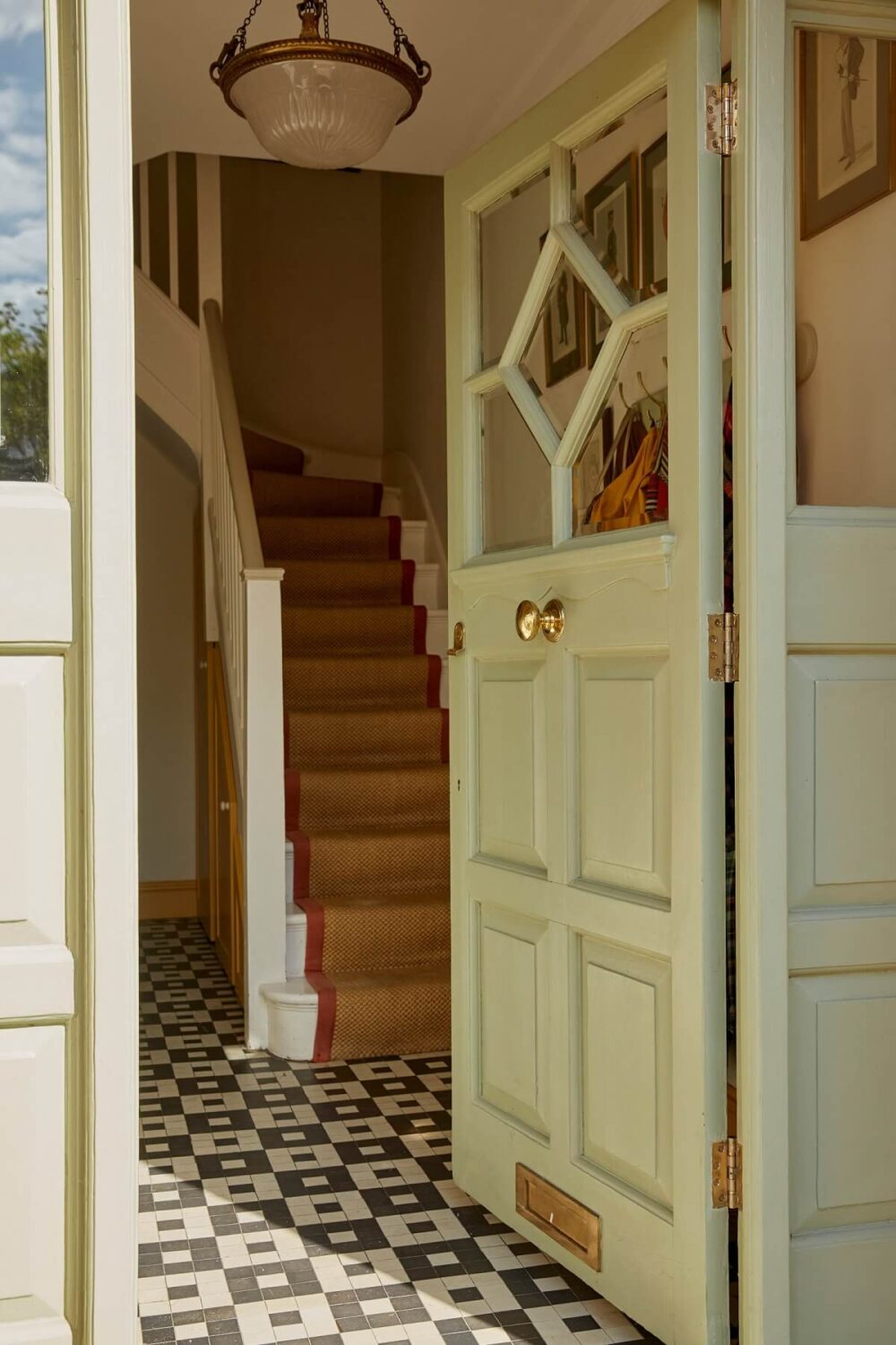 A Colorful Eclectic House Designed by Alice Palmer 29 entry-hallway-black-white-floor-tiles-nordroom