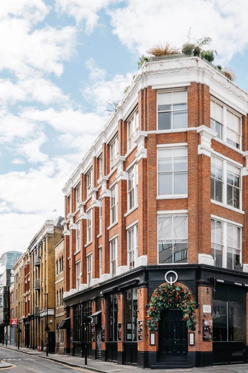 A Modern Apartment with Exposed Brick Walls and Color Accents 16 exterior-galaxy-house-london-nordroom