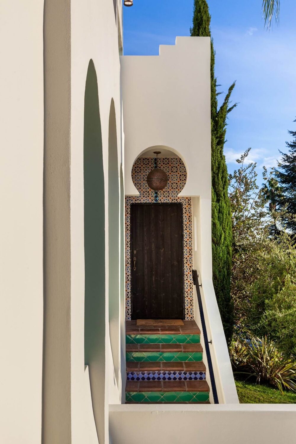 A Bright Spanish-Style Villa in Los Angeles 37 front door colorful stairs spanish style home nordroom A Bright Spanish-Style Villa in Los Angeles