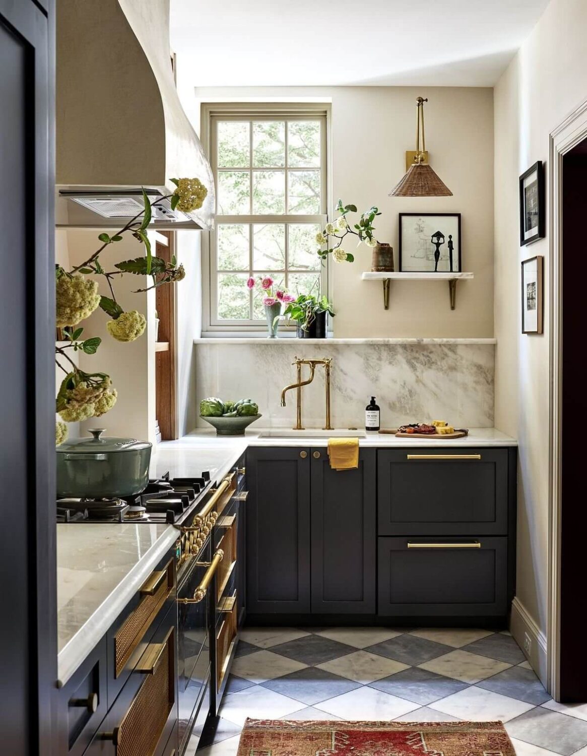 Bold Colors in a Washington D.C. Pied-à-Terre 1 galley-kitchen-blue-cupboards-checkerboard-floor-nordroom