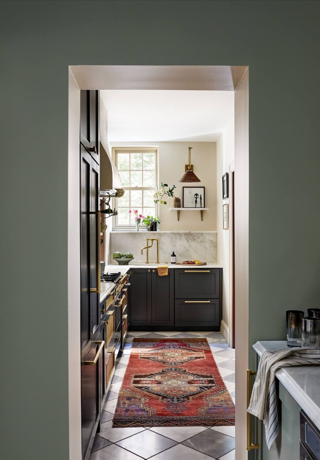 Bold Colors in a Washington D.C. Pied-à-Terre 6 galley-kitchen-checkerboard-floor-nordroom