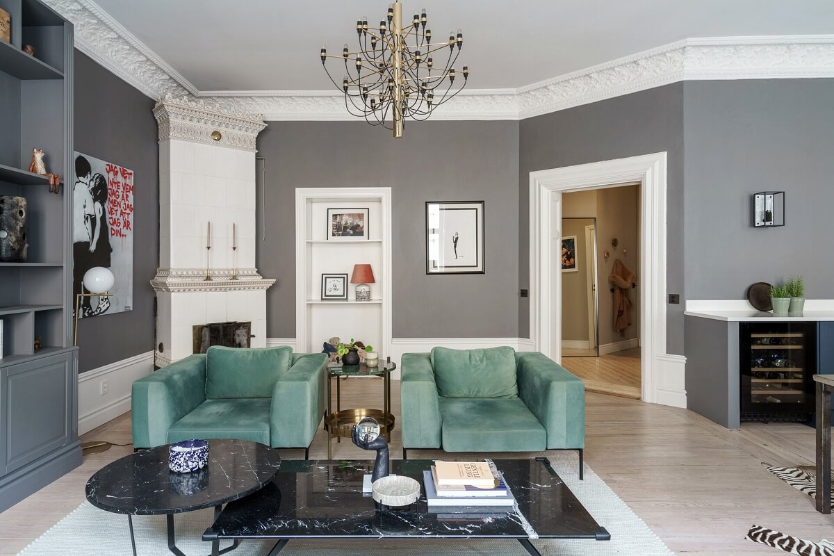 A Classic Nordic Apartment Decorated with Modern Furnishings and Color 6 green-armchairs-living-room-gray-walls-nordroom