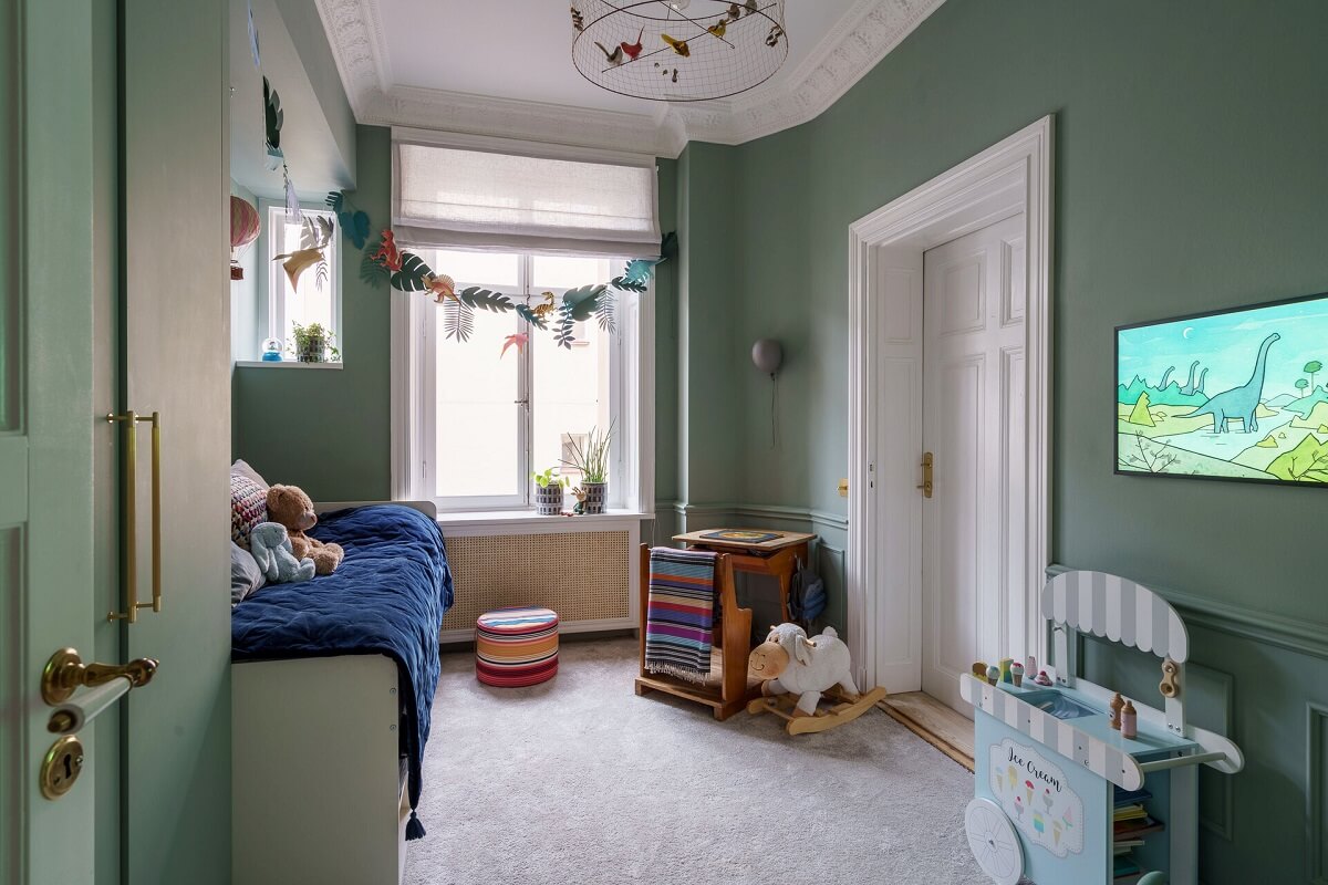 A Classic Nordic Apartment Decorated with Modern Furnishings and Color 17 green-kids-bedroom-vintage-school-desk-nordroom