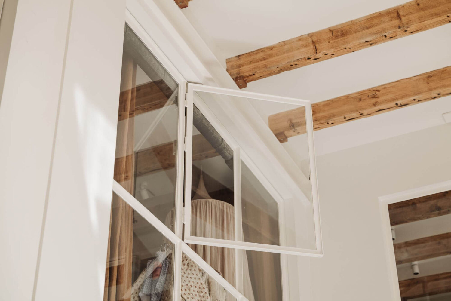 A Modern Family Loft in a Former School Building 13 indoor-window-exposed-wooden-beams-school-conversion-nordroom