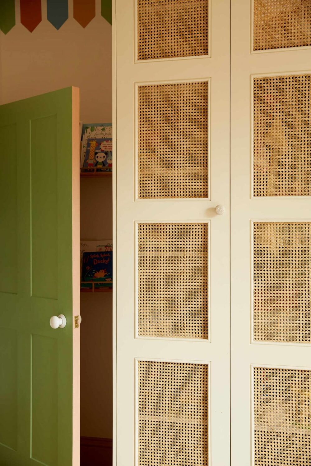 A Colorful Eclectic House Designed by Alice Palmer 23 kids-bedroom-cane-wardrobe-green-door-nordroom