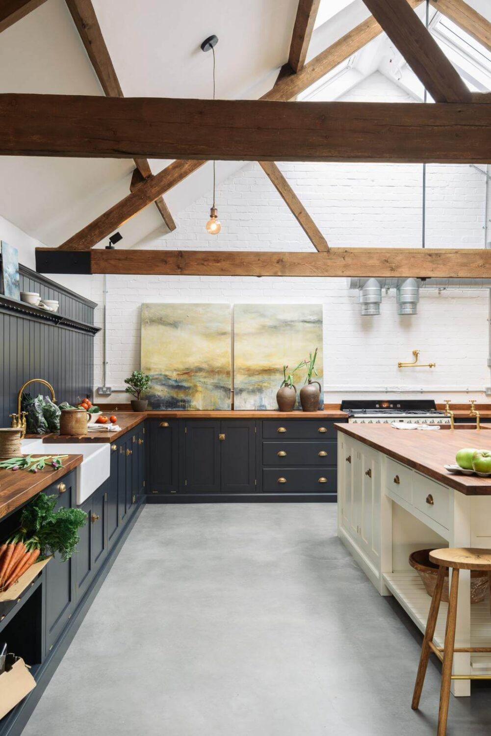 57 Stylish Two-Tone Kitchen Cabinet Ideas 19 kitchen-concrete-floor-high-ceilings-exposed-beams-nordroom