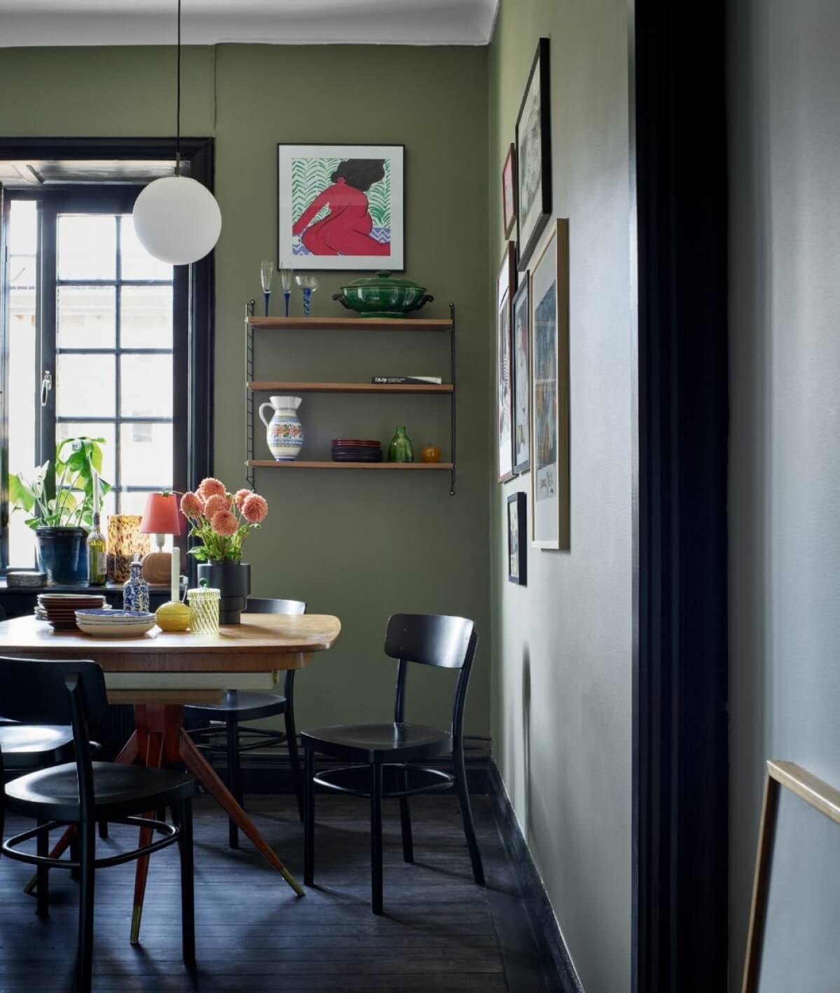 A Colorful Nordic Apartment with Dusty Pink Walls 16 kitchen-detail-dining-table-green-walls-nordroom