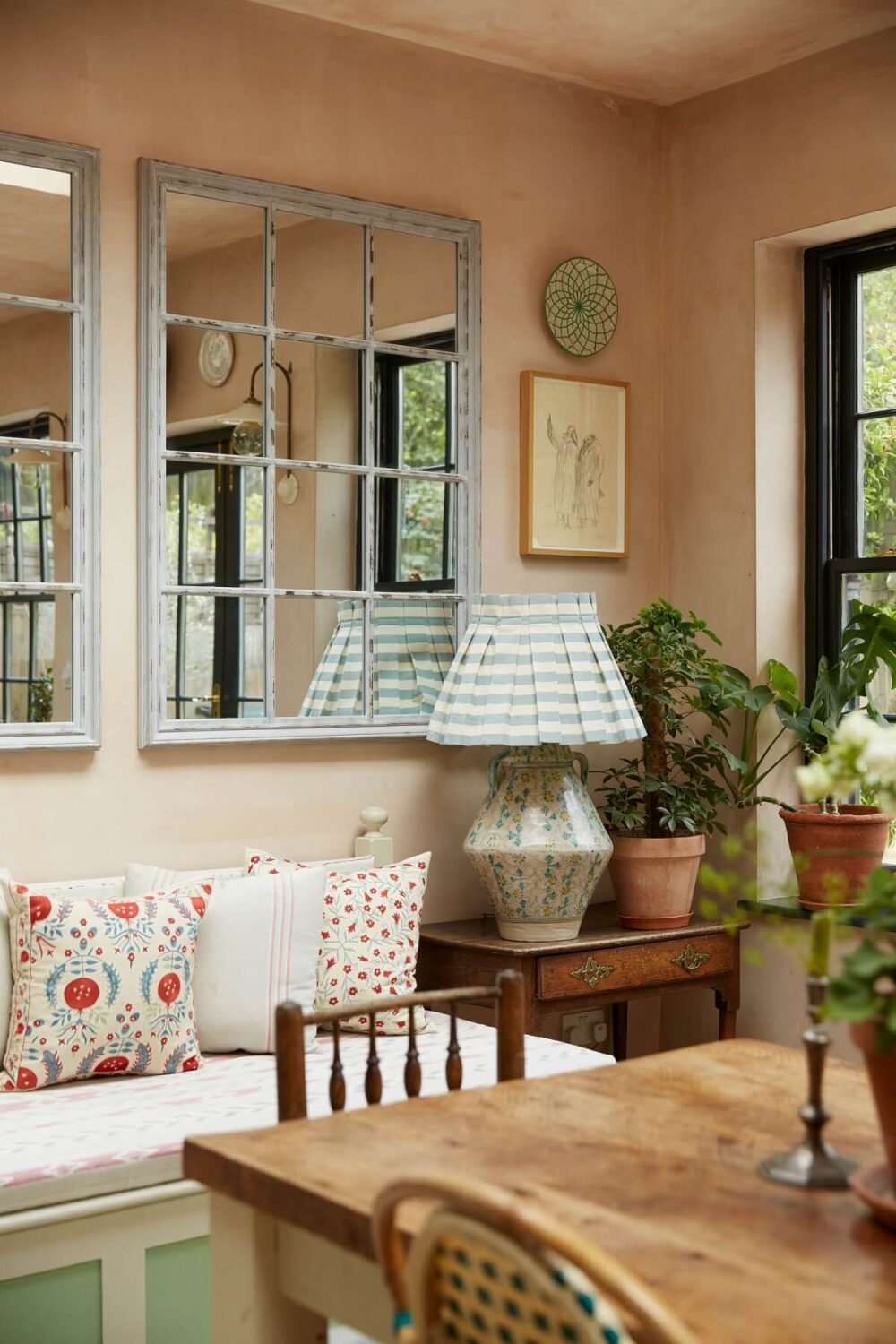 A Colorful Eclectic House Designed by Alice Palmer 4 kitchen-dining-table-bench-mirror-plaster-walls-nordroom