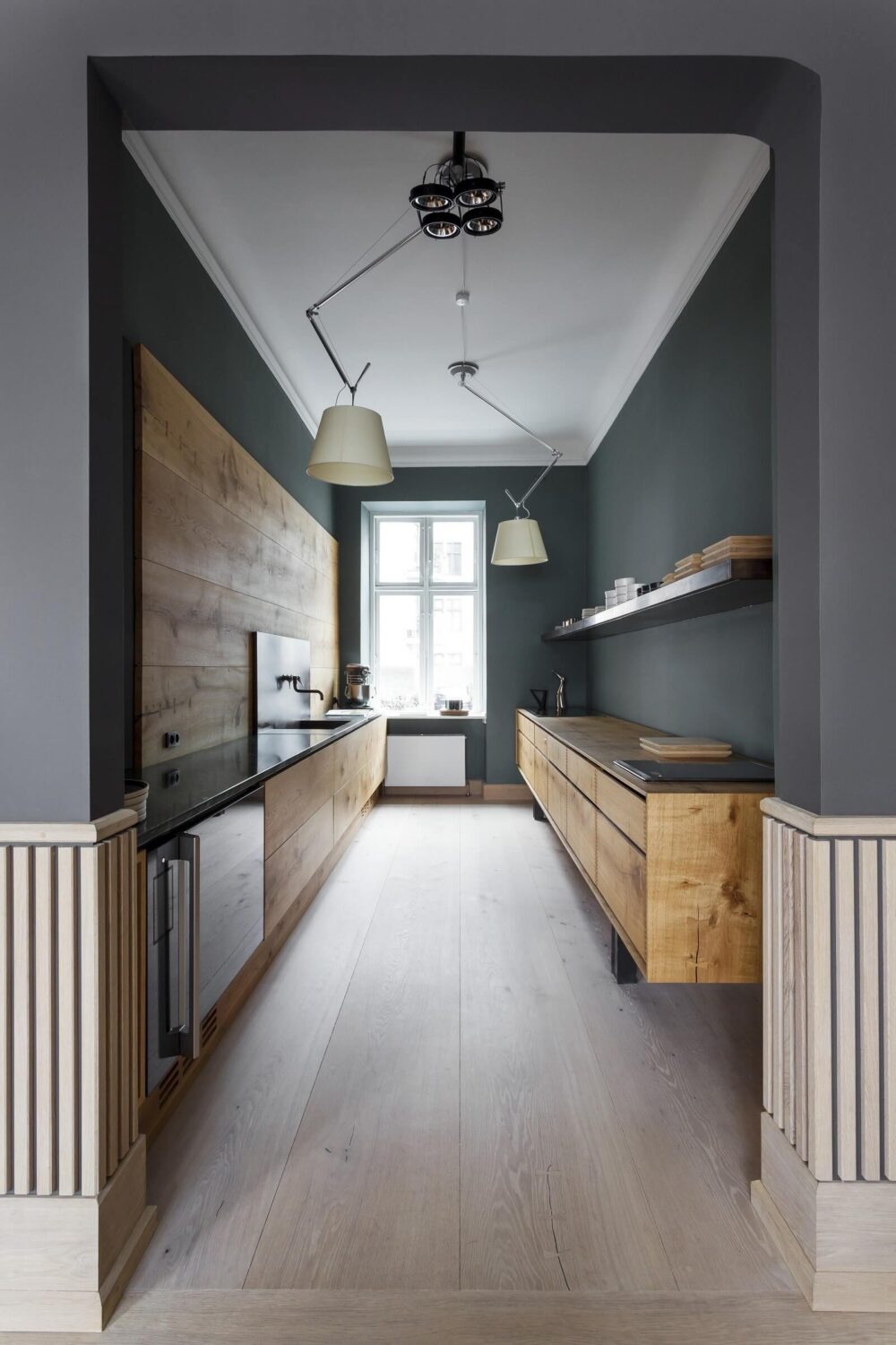 31 Practical Kitchen Flooring Ideas For Your Home 27 kitchen-floating-cabinets-green-walls-wooden-floor-nordroom