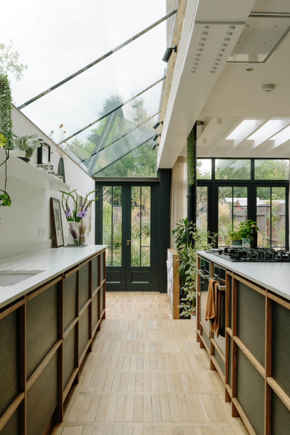 Beautiful Kitchens with Skylights That Add Light and Style 2 kitchen-green-cabinets-skylight-nordroom