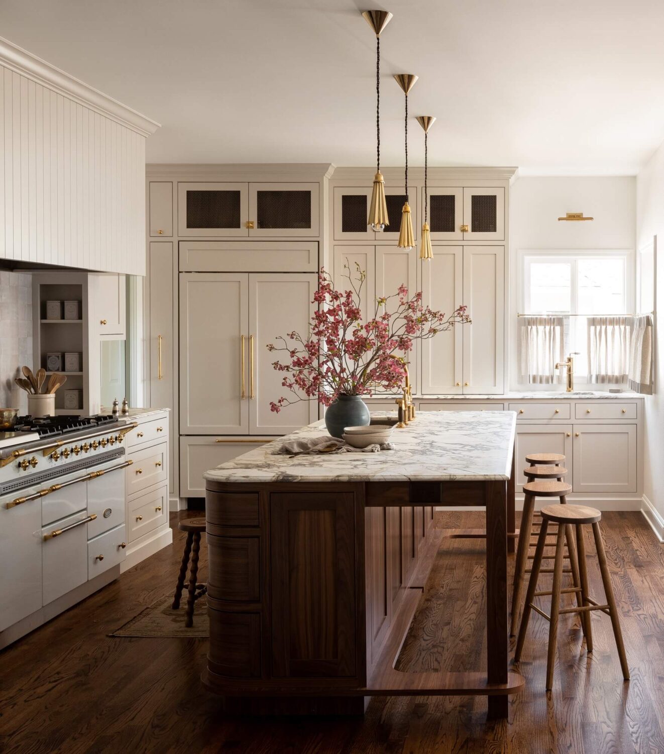 31 Practical Kitchen Flooring Ideas For Your Home 1 kitchen-hard-wooden-floor-round-island-white-cabinets-nordroom