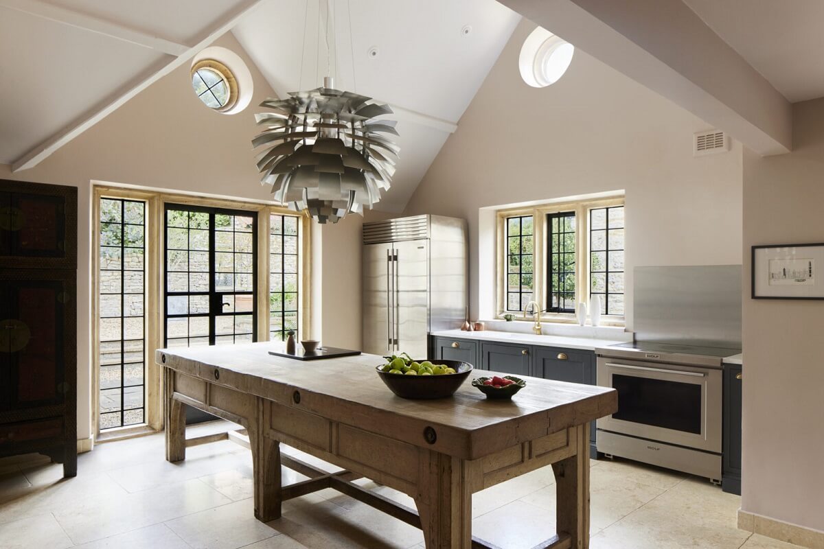 A Restored Elizabethan Manor House in England 6 kitchen-wooden-island-blue-cabinets-nordroom