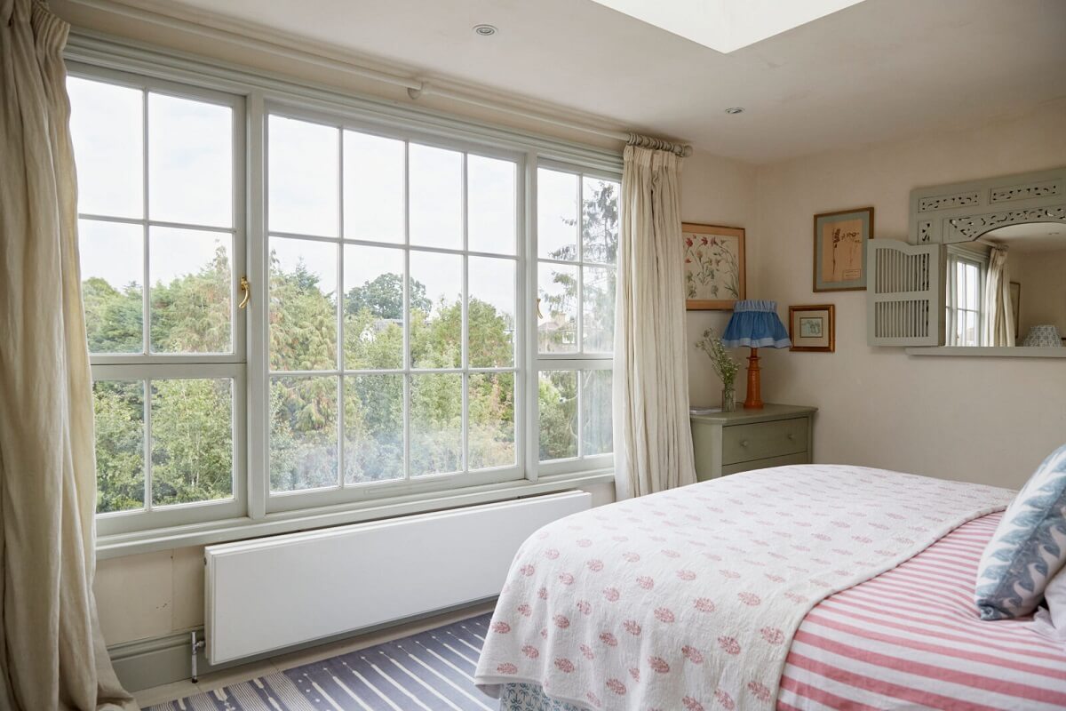 A Colorful Eclectic House Designed by Alice Palmer 14 light-bedroom-beige-walls-skylight-nordroom