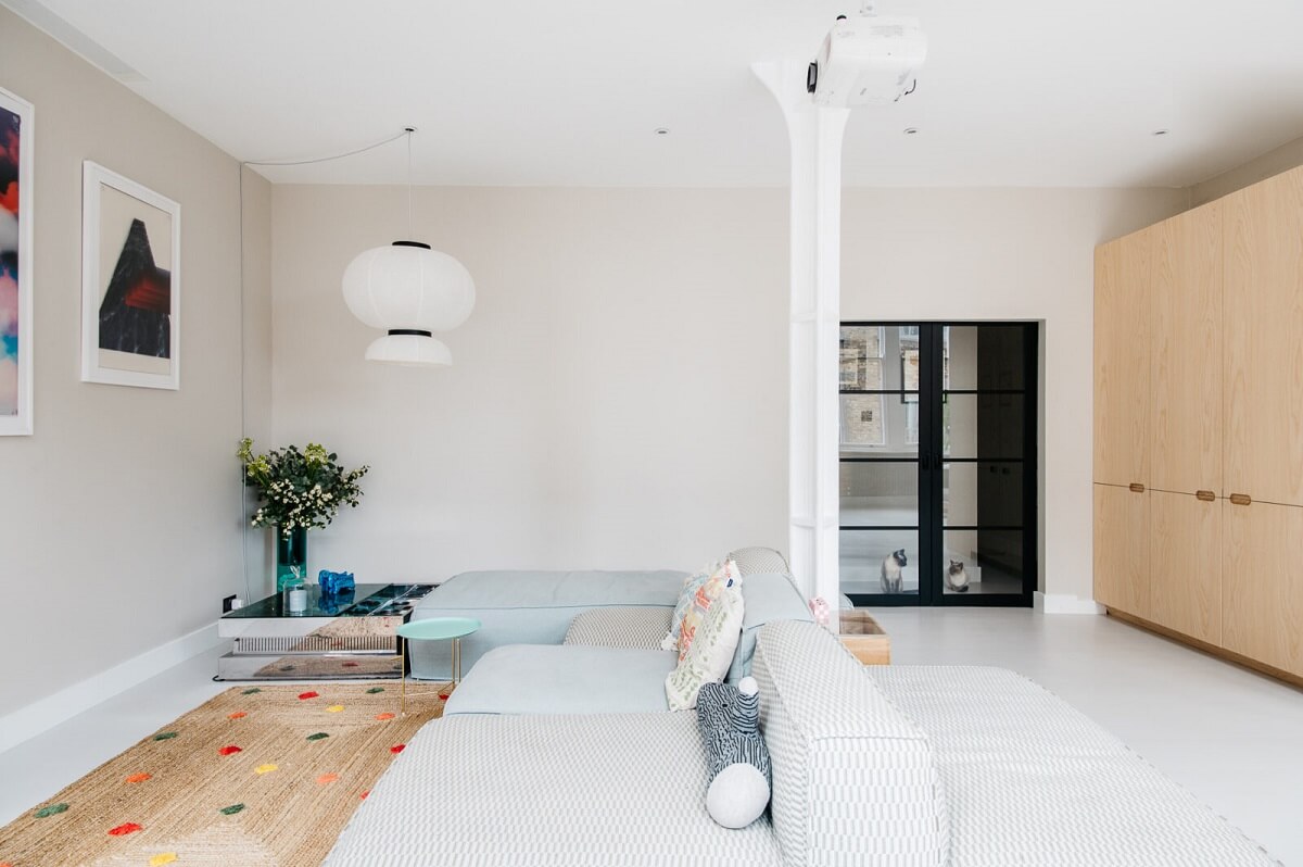 A Modern Apartment with Exposed Brick Walls and Color Accents 7 light-living-space-warehouse-apartment-london-nordroom