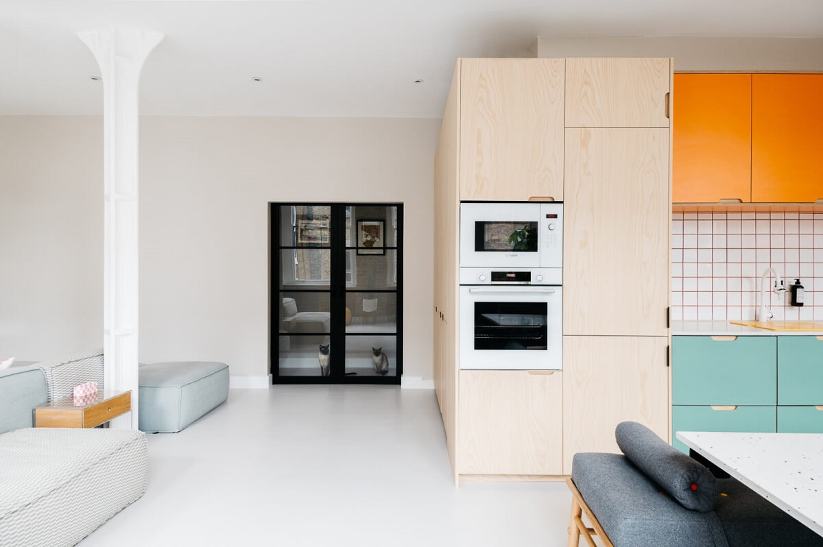 A Modern Apartment with Exposed Brick Walls and Color Accents 4 light-open-plan-kitchen-living-room-london-warehouse-apartment-nordroom