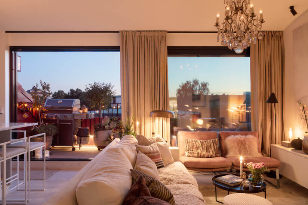 A Small Attic Apartment with Plenty of Storage 2 living-room-attic-apartment-evening-light-nordroom