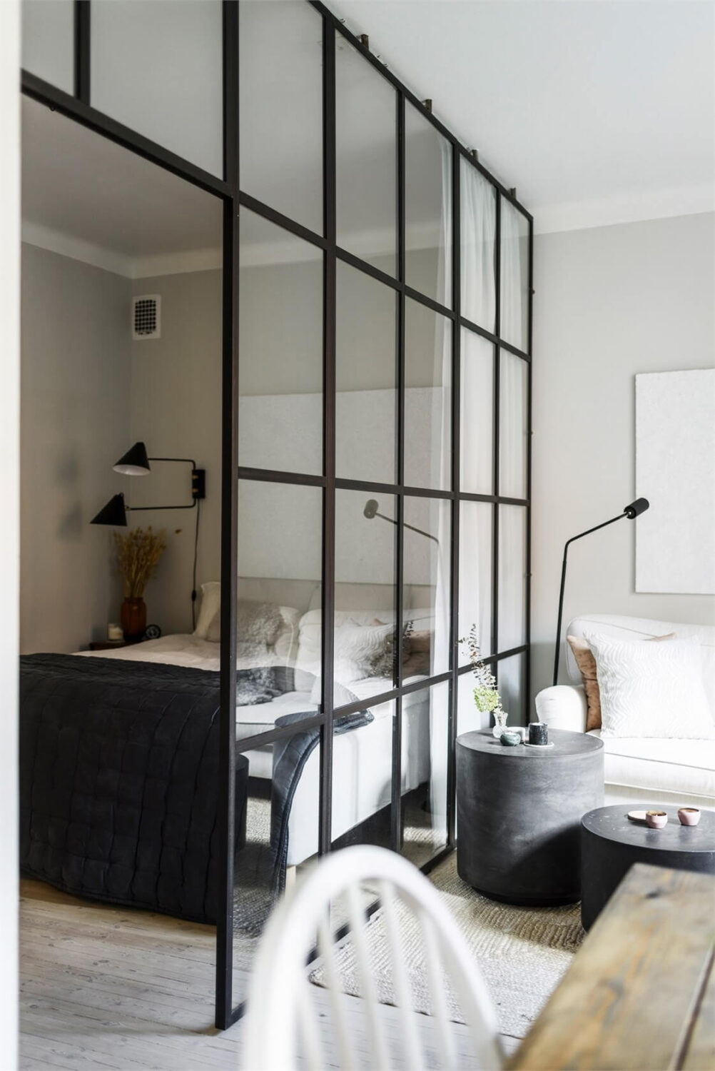 Great Living Room Bedroom Combo Ideas (Layout Tips + Styling) 15 living-room-bedroom-combos-glass-partition-wall-nordroom
