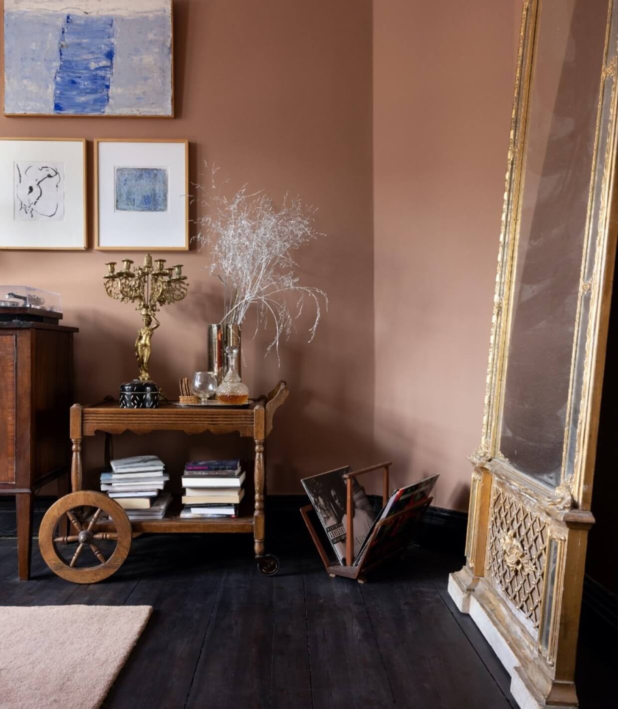 A Colorful Nordic Apartment with Dusty Pink Walls 4 living-room-detail-pink-walls-dark-floor-nordroom