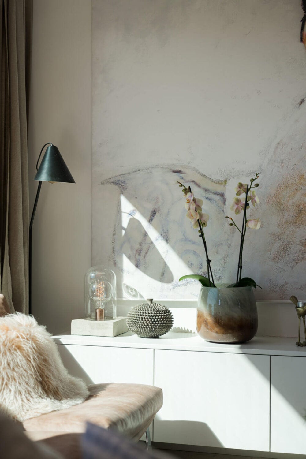 A Small Attic Apartment with Plenty of Storage 3 living-room-detail-whire-cabinets-natural-light-nordroom
