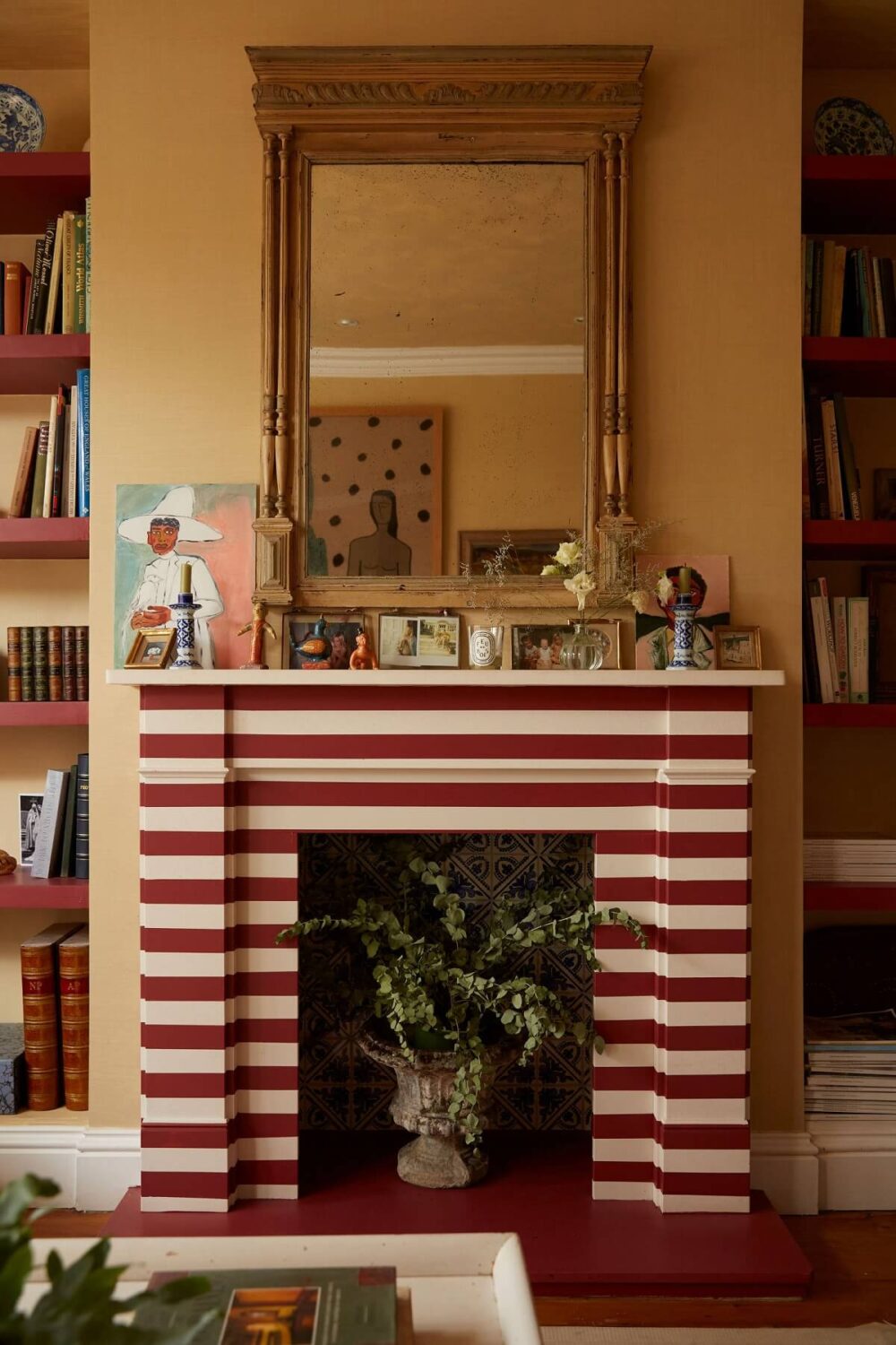 A Colorful Eclectic House Designed by Alice Palmer 9 living-room-striped-fireplace-mirror-nordroom