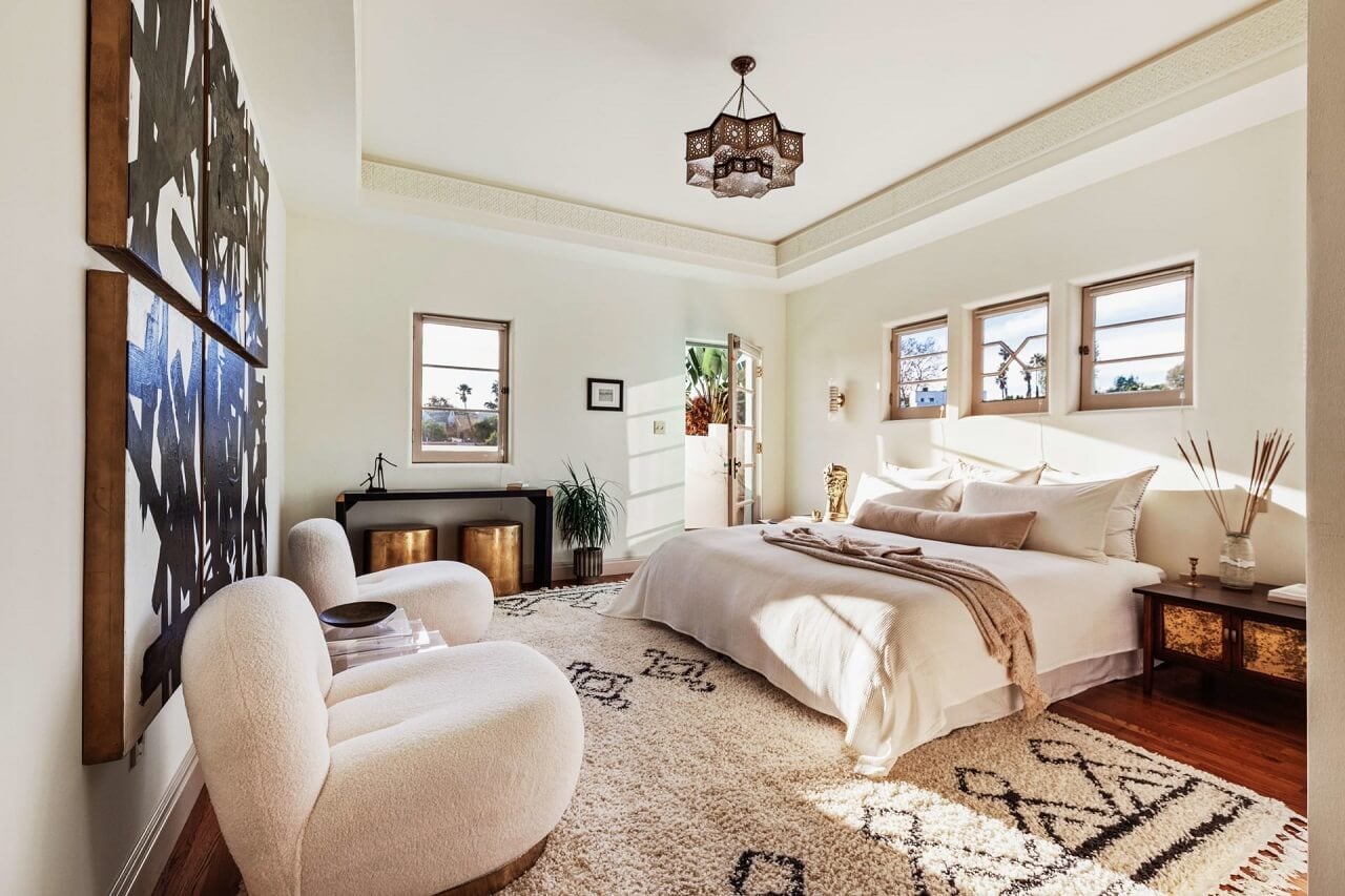 A Bright Spanish-Style Villa in Los Angeles 14 master-bedroom-white-walls-large-rug-armchairs-nordroom
