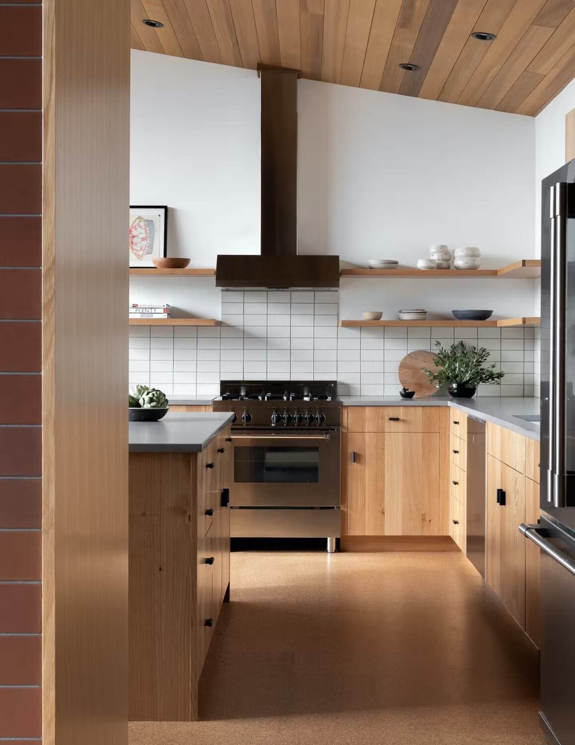 31 Practical Kitchen Flooring Ideas For Your Home 29 modern-kitchen-oak-cabinets-cork-floor-nordroom