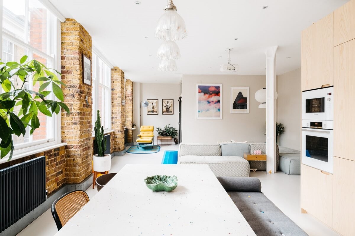 A Modern Apartment with Exposed Brick Walls and Color Accents 5 modern-open-plan-living-room-london-exposed-brick-nordroom