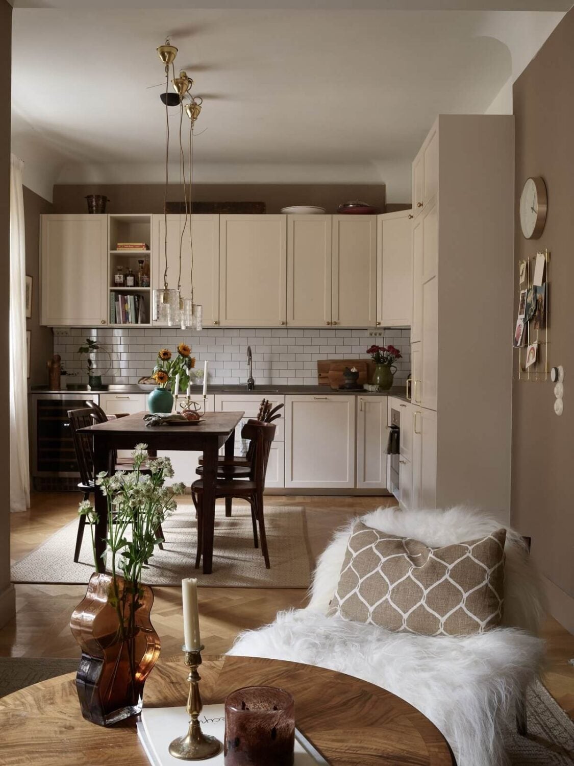 A Warm Nordic Apartment with Light Brown Walls 6 open-plan-kitchen-living-room-brown-walls-nordroom