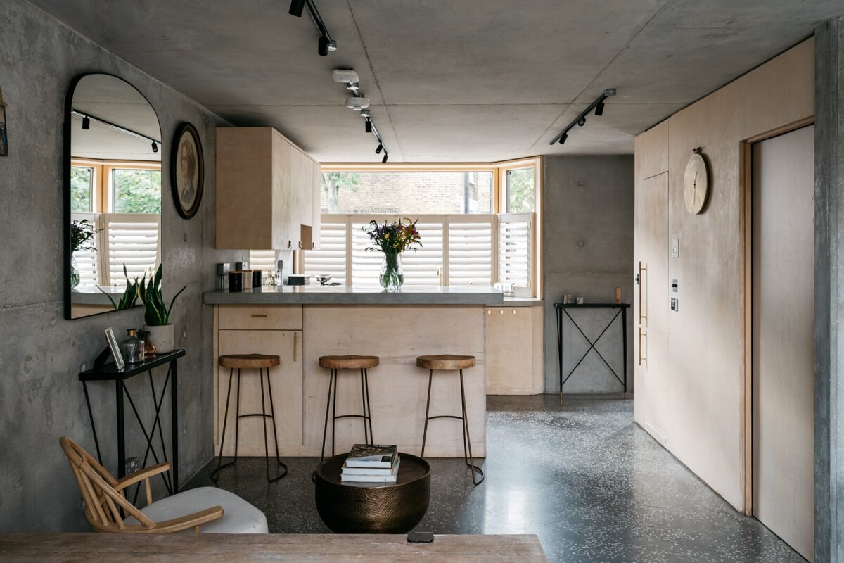 A Contemporary Version of a Victorian Terrace House 3 open-plan-living-room-kitchen-breakfast-bar-concrete-walls-nordroom