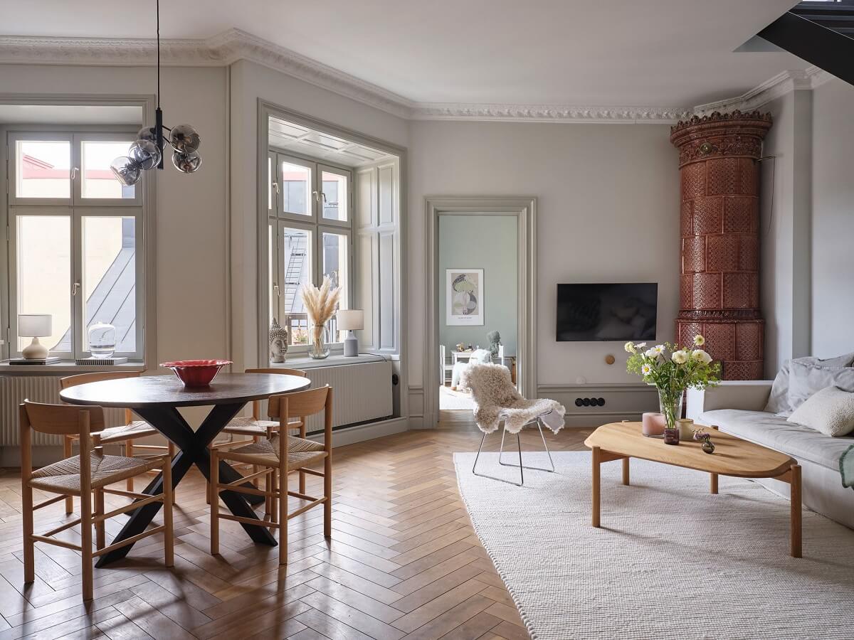 A Stylish Nordic Apartment with Attic Bedroom 2 open-plan-living-space-brown-fireplace-nordic-design-nordroom