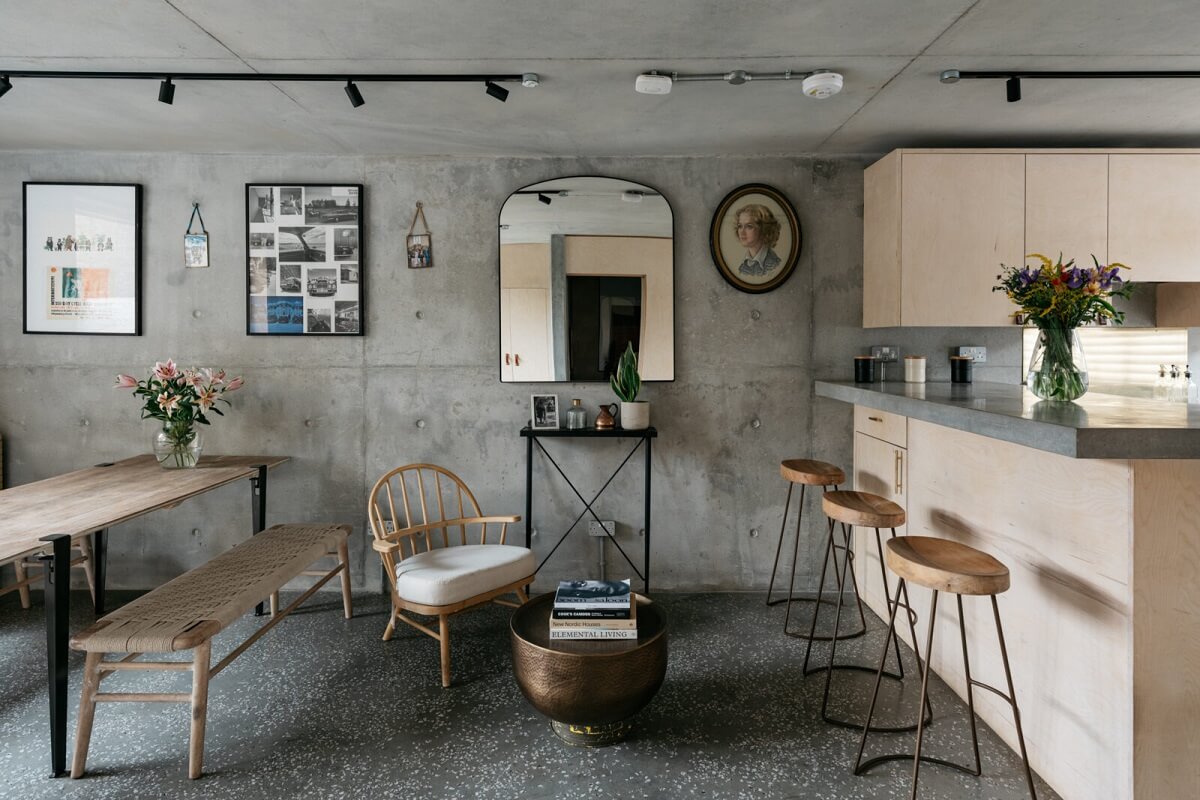 A Contemporary Version of a Victorian Terrace House 1 open-plan-living-space-concrete-walls-breakfast-bar-terrazzo-floor-nordroom