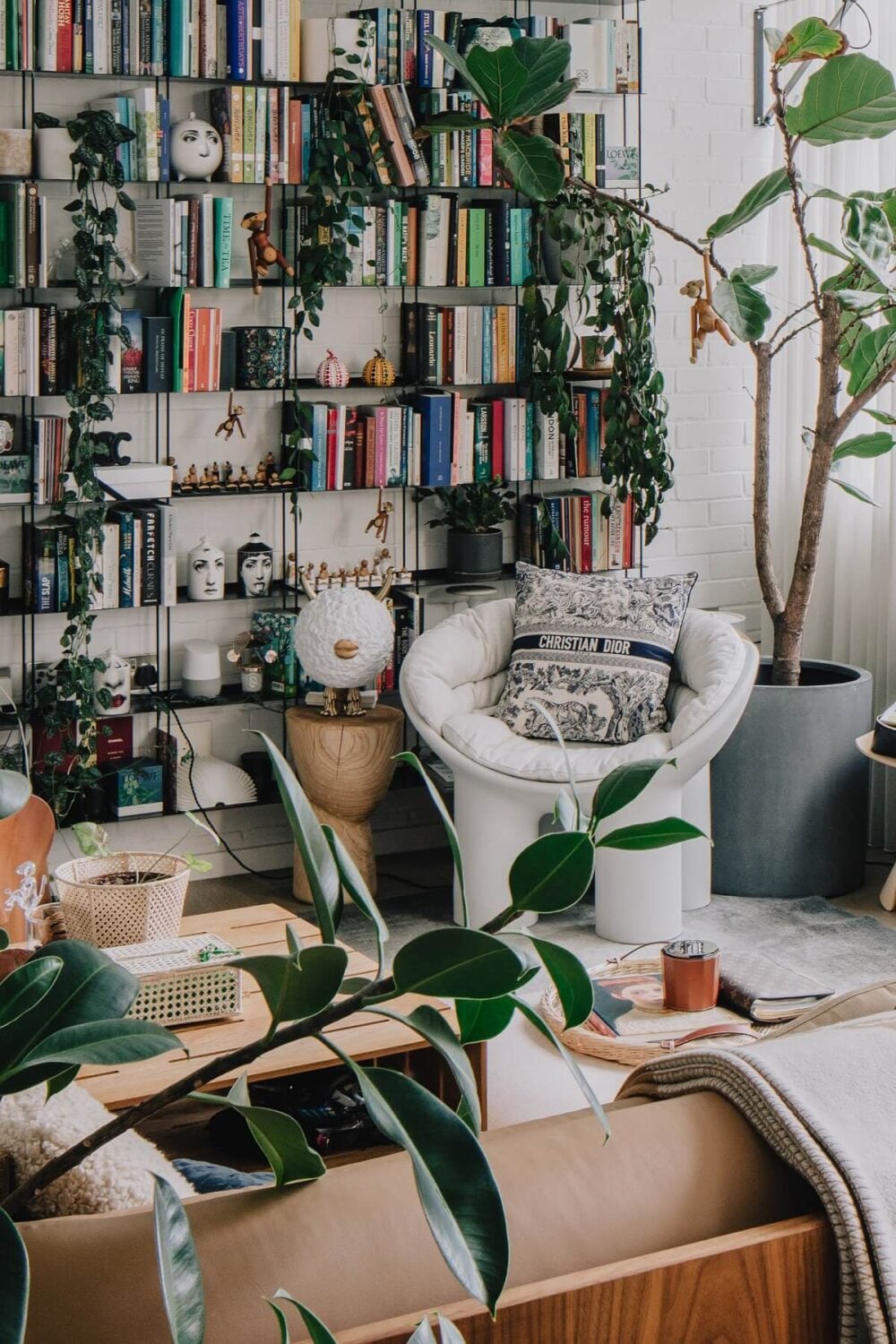 36 Home Library Ideas That Are A Book-Lover's Dream 15 plant-filled-living-space-bookshelves-warehouse-conversion-london-nordroom