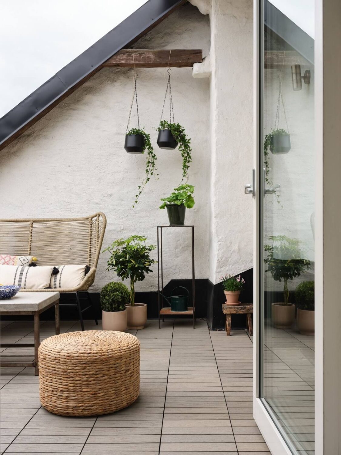 A Stylish Nordic Apartment with Attic Bedroom 23 roof-terrace-seating-nordic-apartment-nordroom