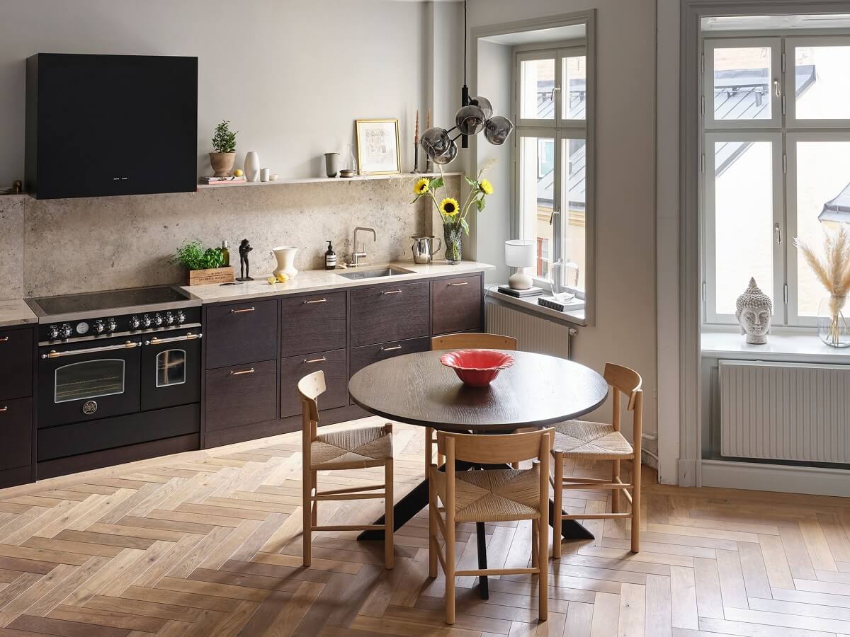 A Stylish Nordic Apartment with Attic Bedroom 7 round-dining-table-open-plan-kitchen-living-space-nordic-design-nordroom