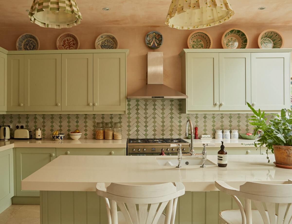 A Colorful Eclectic House Designed by Alice Palmer 6 sage-green-kitchen-cabinets-plaster-walls-island-alice-palmer-nordroom