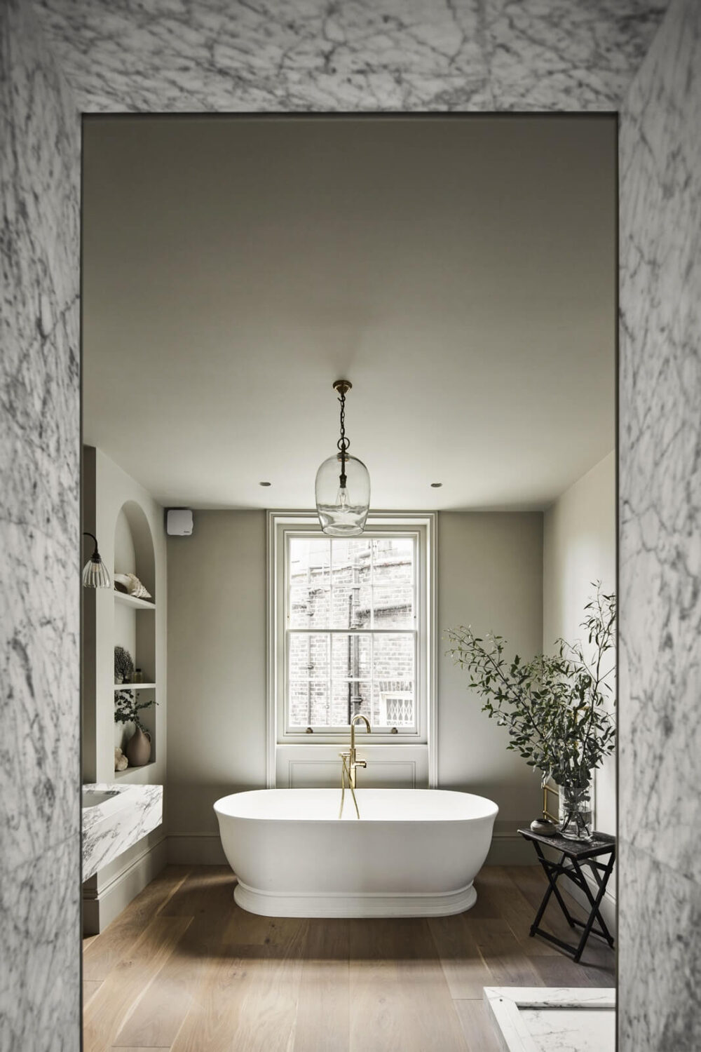 A Stylish Regency Townhouse in London 18 serene-bathroom-freestanding-bath-marble-townhouse-nordroom