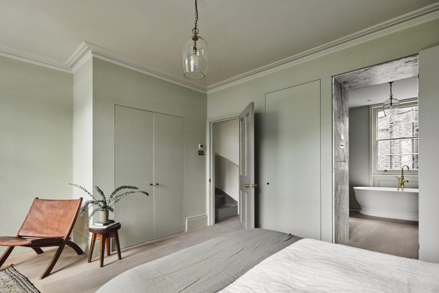 A Stylish Regency Townhouse in London 17 serene-master-bedroom-built-in-wardrobes-nordoom