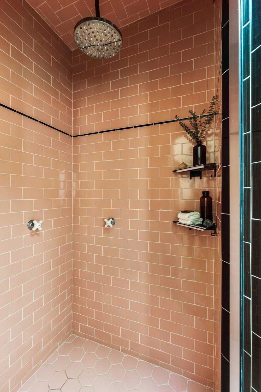 89 Pink Bathroom Ideas: From Hot Pink Walls to Blush Tiles 101 shower-pink-black-tiles-nordroom