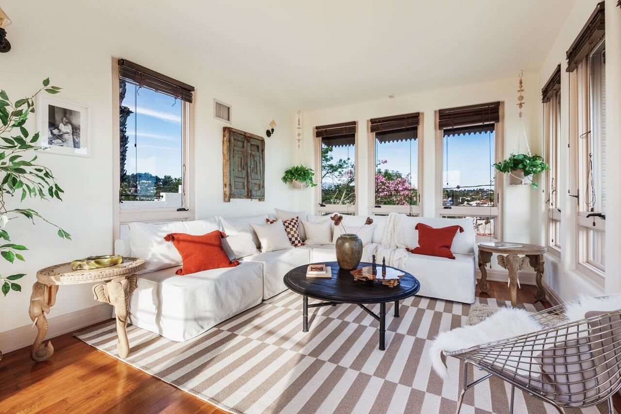 A Bright Spanish-Style Villa in Los Angeles 26 sitting-room-large-striped-rug-spanish-style-home-nordroom