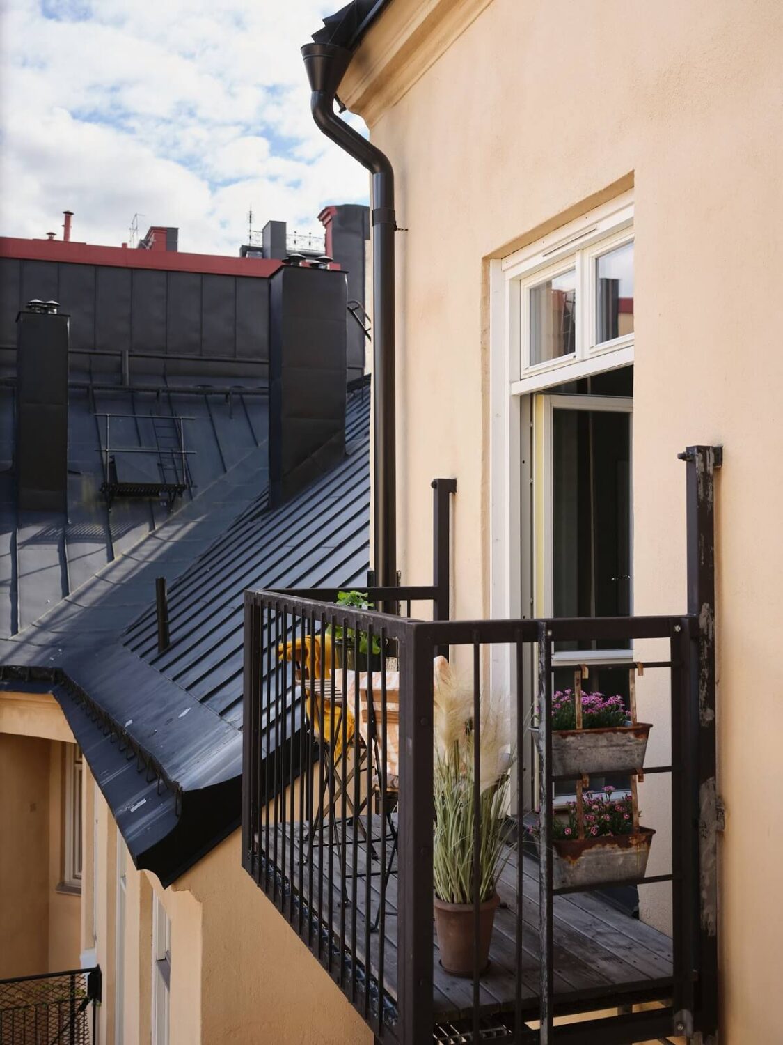 A Stylish Nordic Apartment with Attic Bedroom 13 small-balcony-nordic-apartment-nordroom