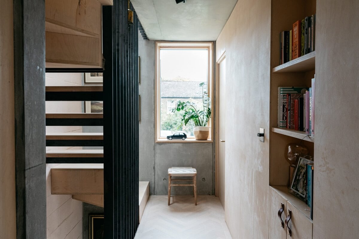 A Contemporary Version of a Victorian Terrace House 11 steel-staircase-landing-built-in-closets-nordroom