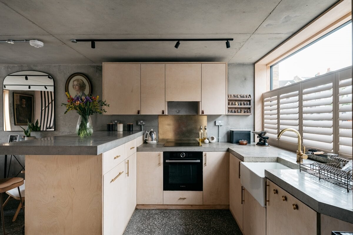 A Contemporary Version of a Victorian Terrace House 4 u-shaped-kitchen-polished-concrete-worktops-belfast-sink-granite-terrazzo-floor-nordroom