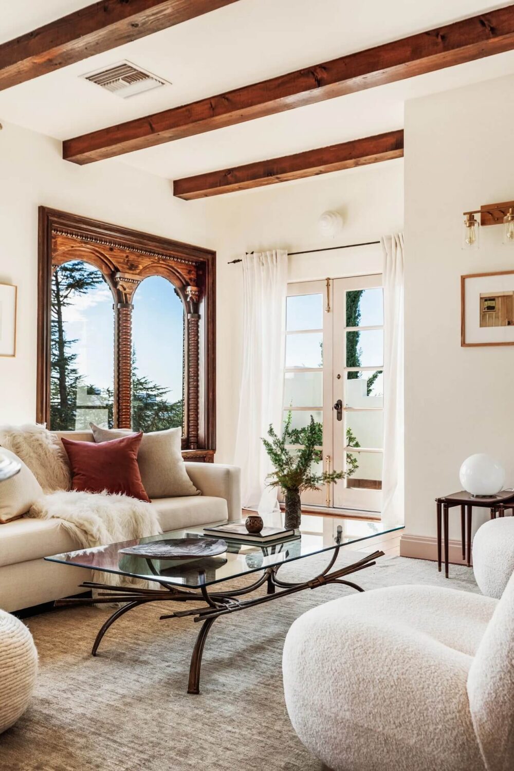A Bright Spanish-Style Villa in Los Angeles 30 upstairs-sitting-room-white-walls-exposed-wooden-beams-nordroom