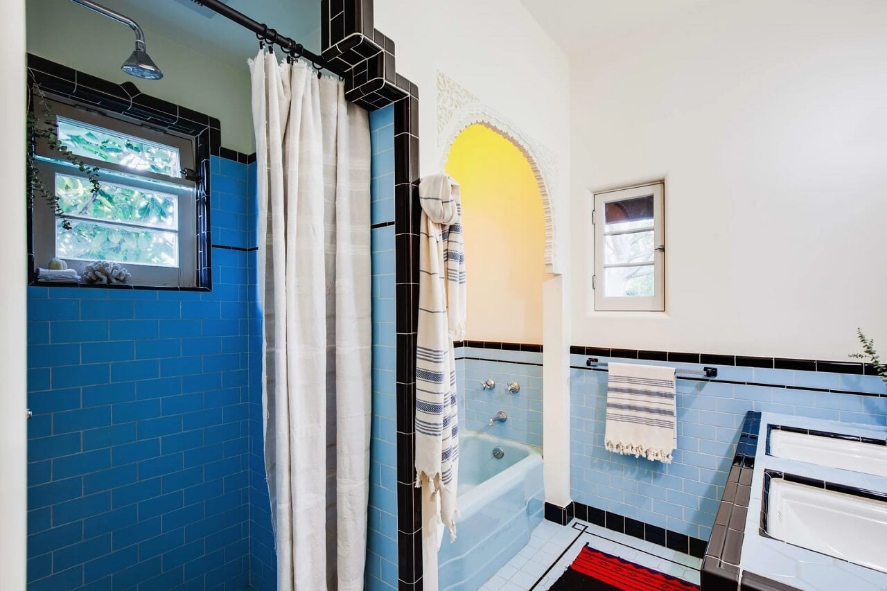 A Bright Spanish-Style Villa in Los Angeles 23 vintage-style-bathroom-blue-tiles-arch-nordroom