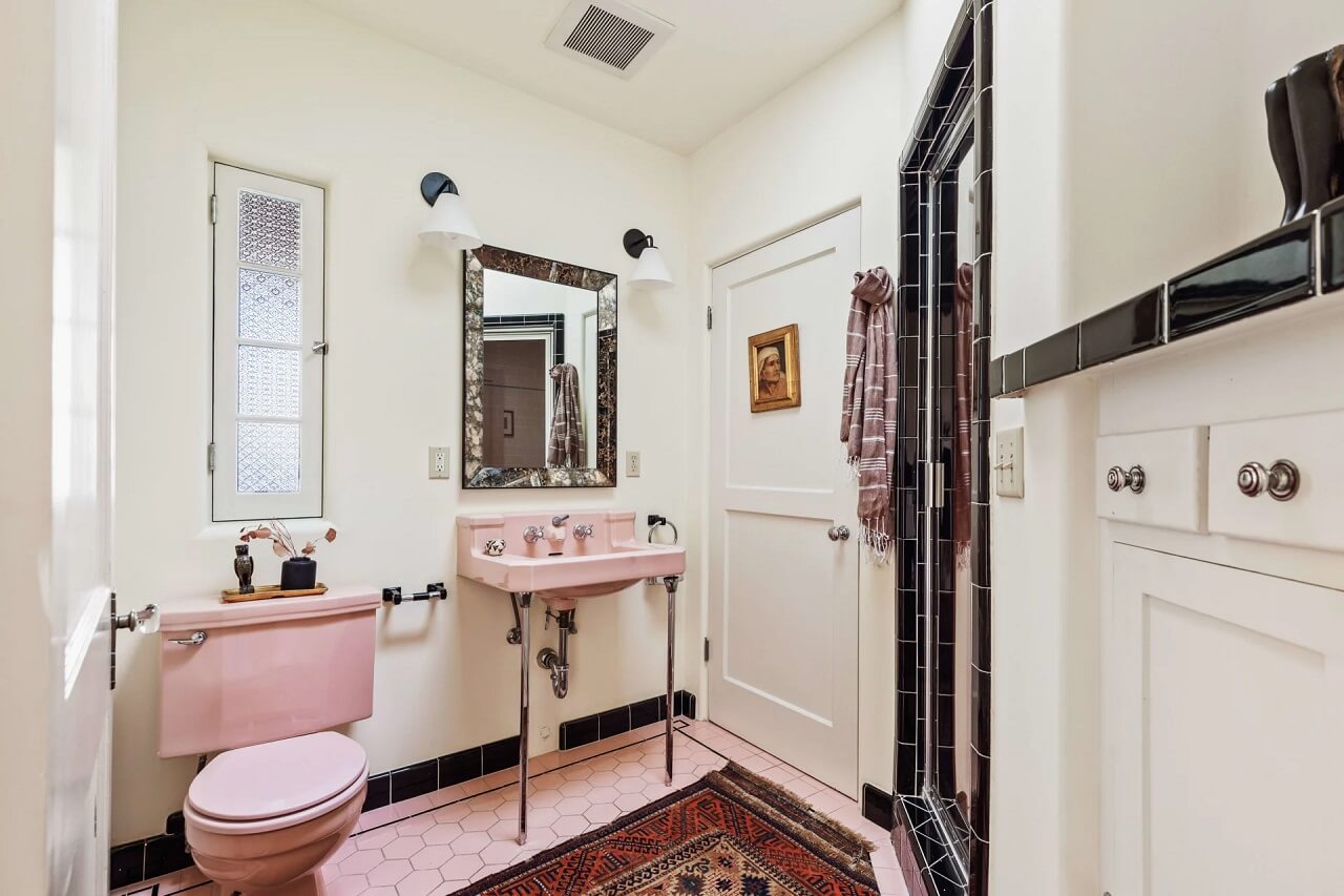 89 Pink Bathroom Ideas: From Hot Pink Walls to Blush Tiles 106 vintage-style-bathroom-pink-sink-nordroom