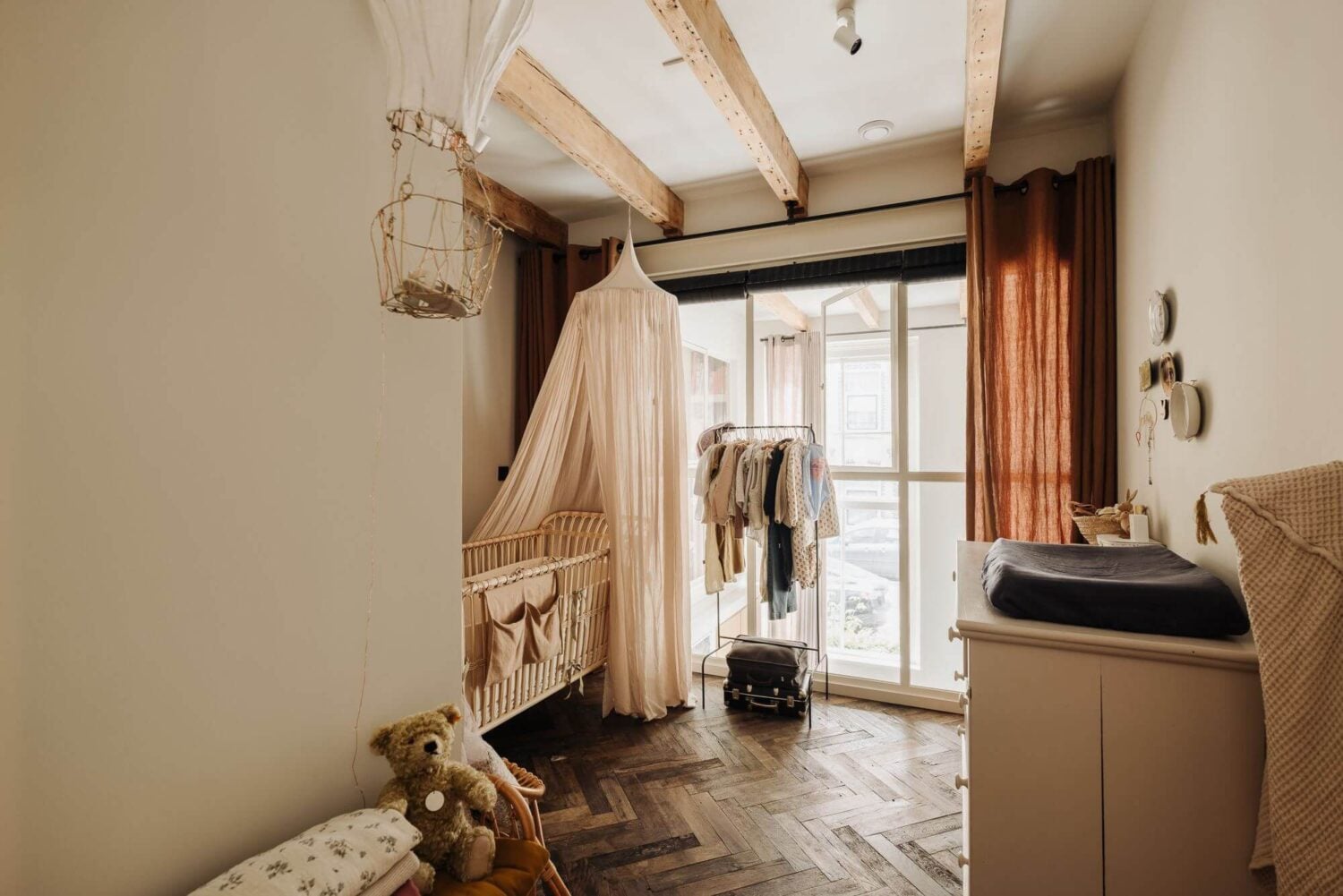 A Modern Family Loft in a Former School Building 21 warm-baby-room-earthy-color-accents-nordroom