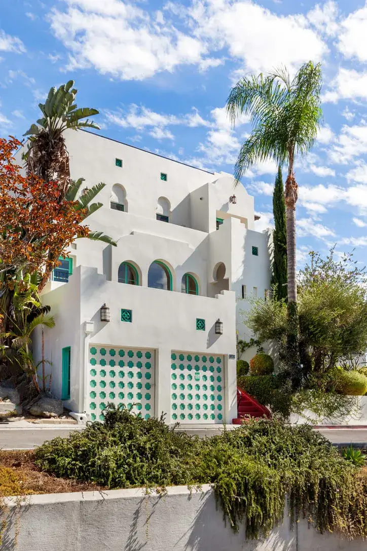 A Bright Spanish-Style Villa in Los Angeles 38 white exterior blue accents spanish style villa nordroom A Bright Spanish-Style Villa in Los Angeles