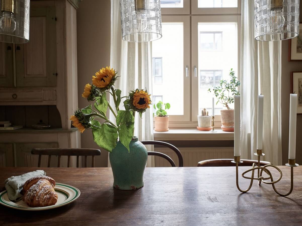 A Warm Nordic Apartment with Light Brown Walls 8 wooden-dining-table-detail-nordroom