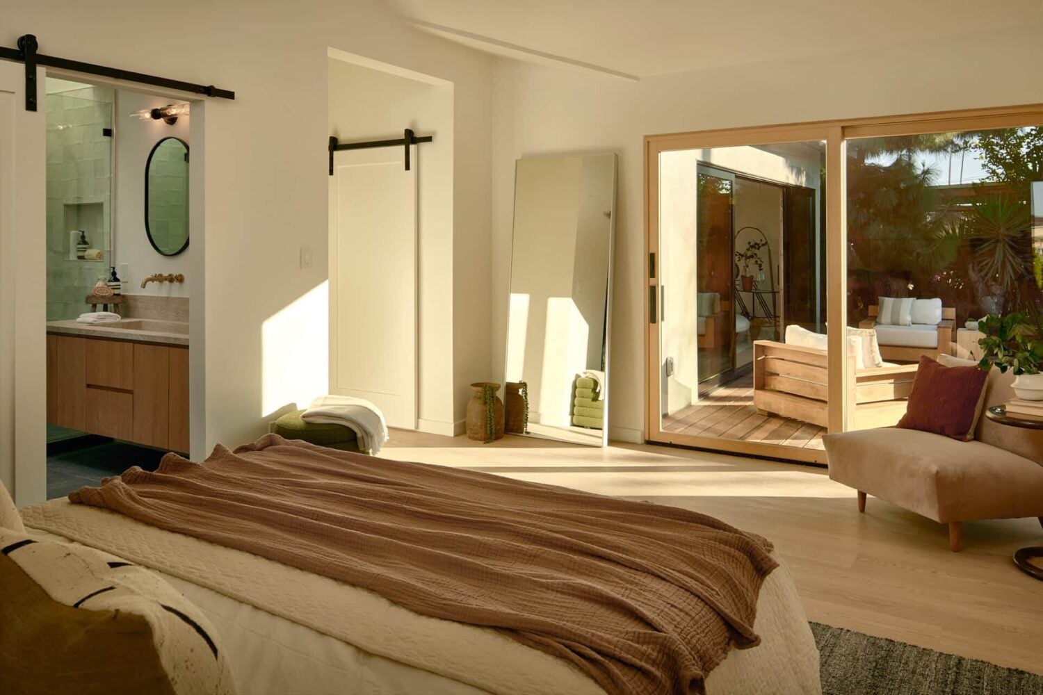 A Stylish Los Angeles Bungalow Renovated by a Designer 10 bedroom-en-suite-bathroom-sliding-door-garden-nordroom