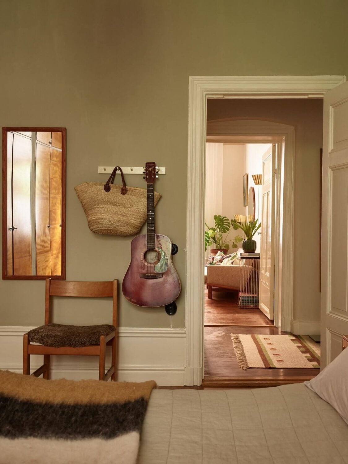 A Charming Vintage Apartment in Stockholm 13 bedroom-green-walls-cozy-vintage-apartment-nordroom